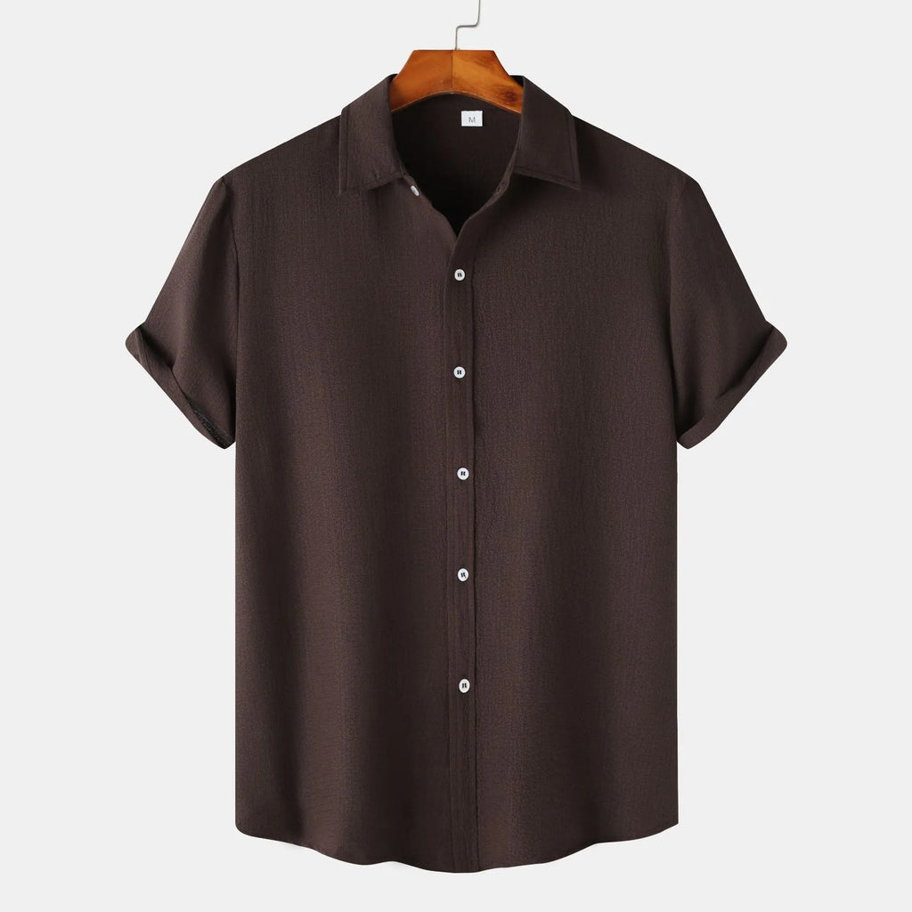 Man wearing a casual short-sleeve polyester shirt in a cardigan style, available in various colours and sizes.