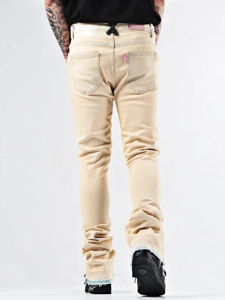 Elastic Youth Heavy Duty Flare Jeans in apricot cotton stretch denim with medium high waist and stone washed finish on model
