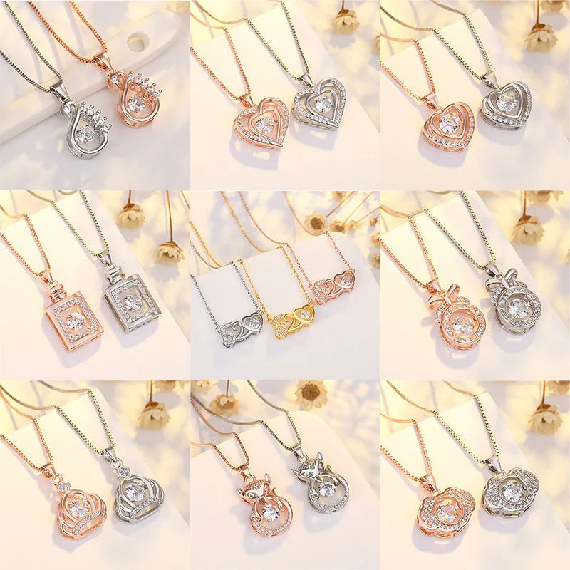 Silver or rose gold plated heart pendant necklace for women with crown and bow detailing on a chain.
