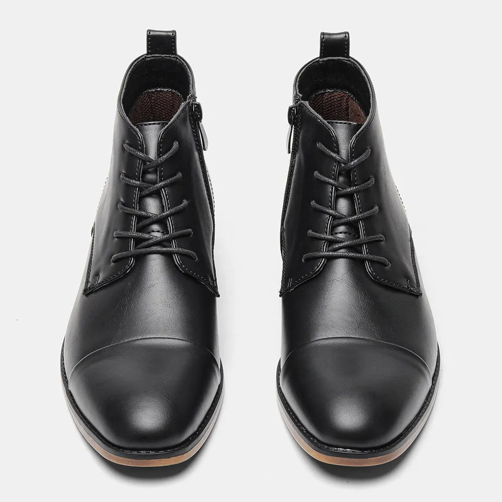 Men's brown plus size Chelsea boot with side zipper, round toe, and low heel.
