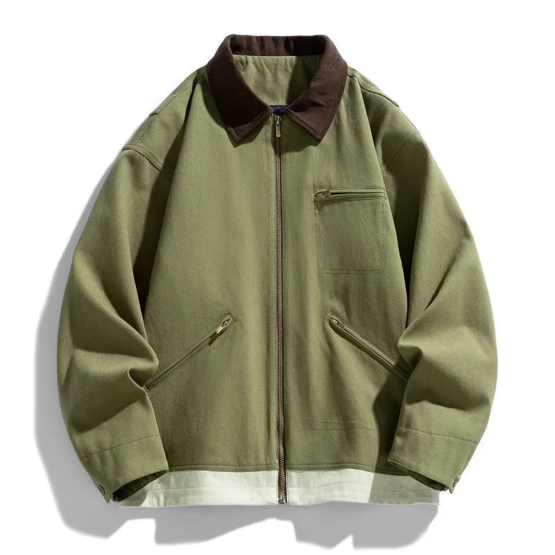 Man wearing a mint green loose fit polyester couple jacket with contrast lapels and side seam pockets.