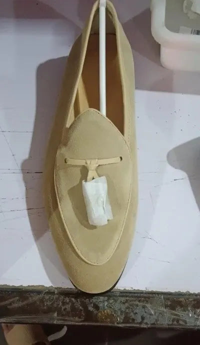 Pair of brown suede slip on loafers made from genuine cowhide leather for men