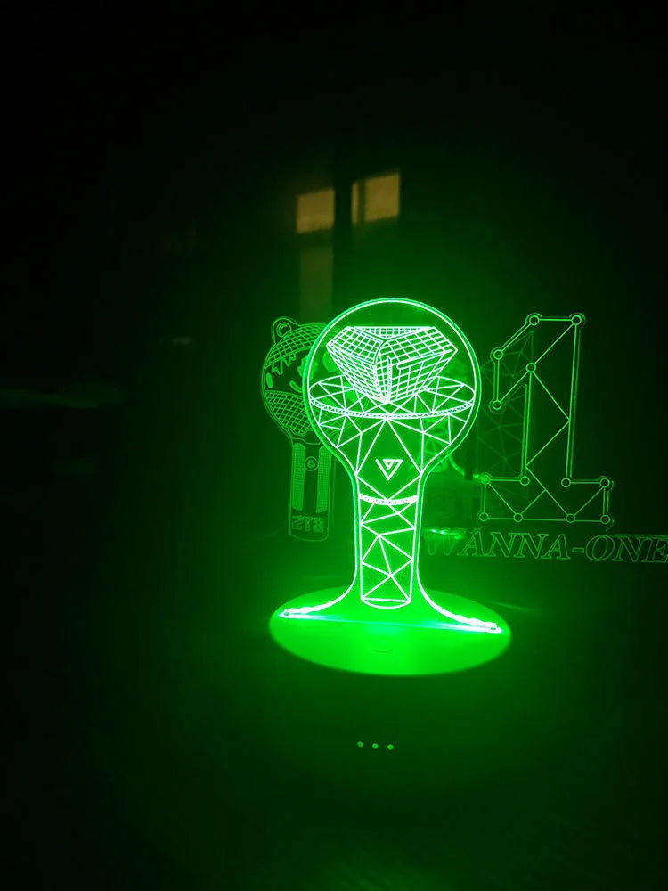 Clear acrylic display stand supporting 101 Tower Gem BTS lamp with universal voltage compatibility