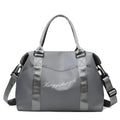 Medium 36-55L Oxford cloth travel duffel bag with zip pockets, soft handle, available in blue, black, grey and pink.
