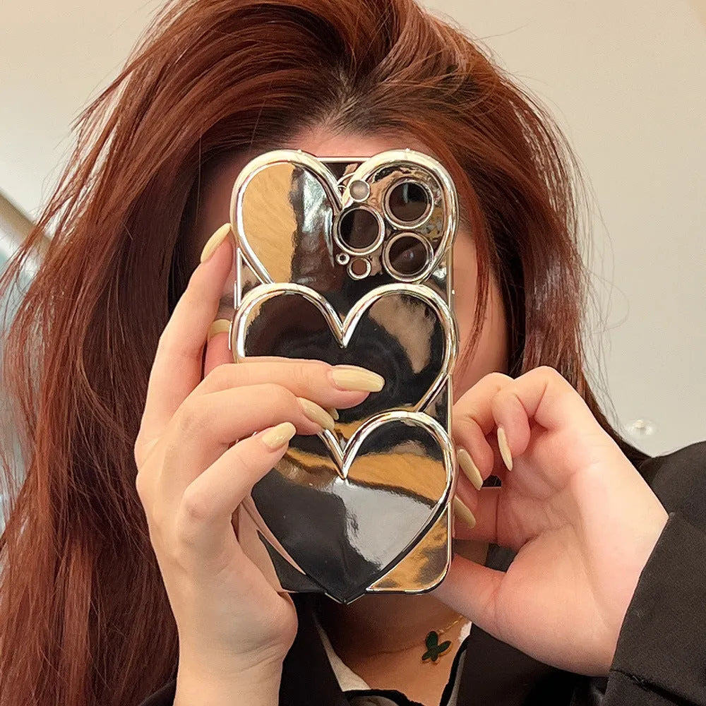 iPhone case with a 3D electroplated red love heart on a solid colour TPU soft shell.