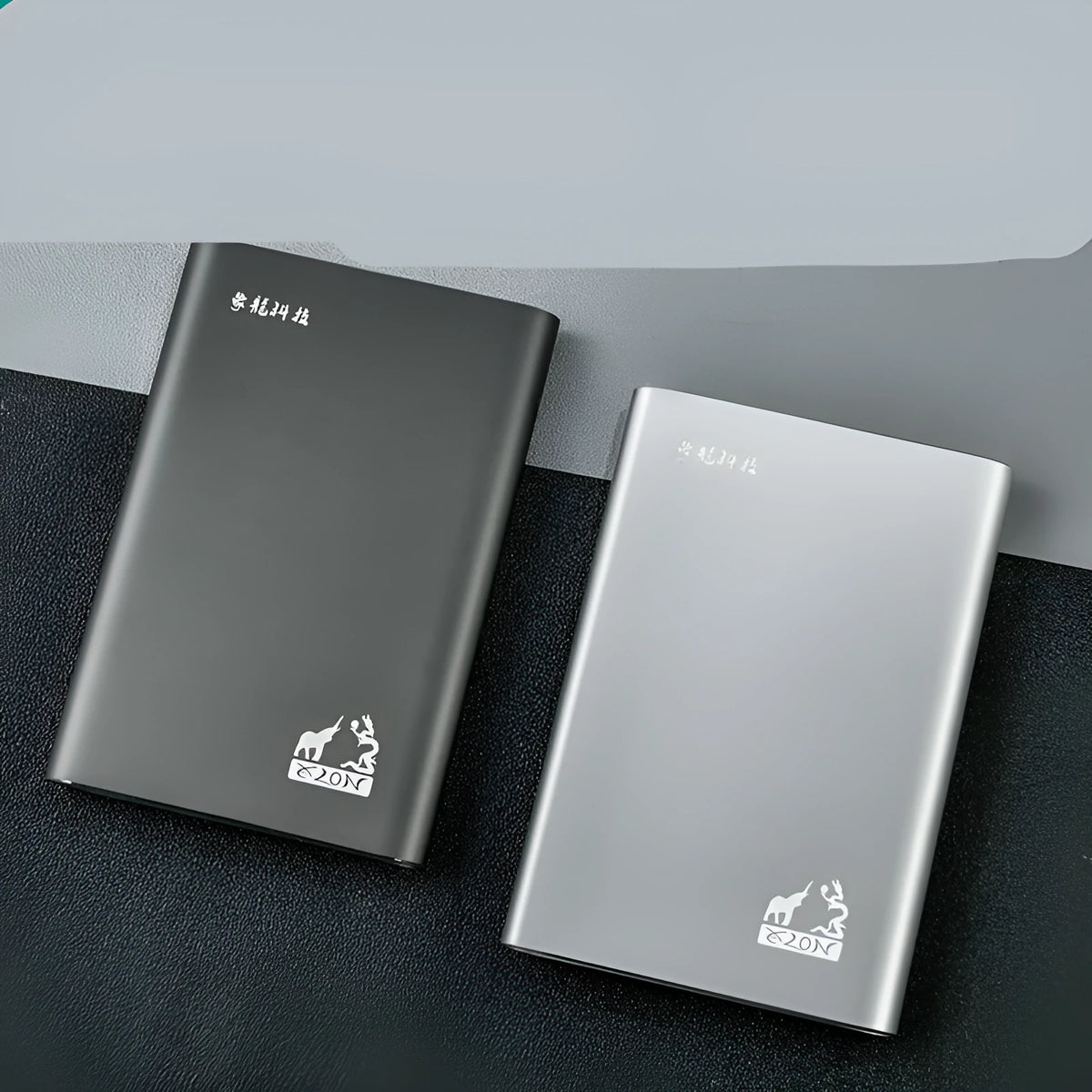 2.5 inch metal external hard drive in black with USB 3.0 cable and indicator light