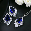 Formal jewellery set with chain, pendant, and matching earrings in blue, red, or white colours for bridal banquets.