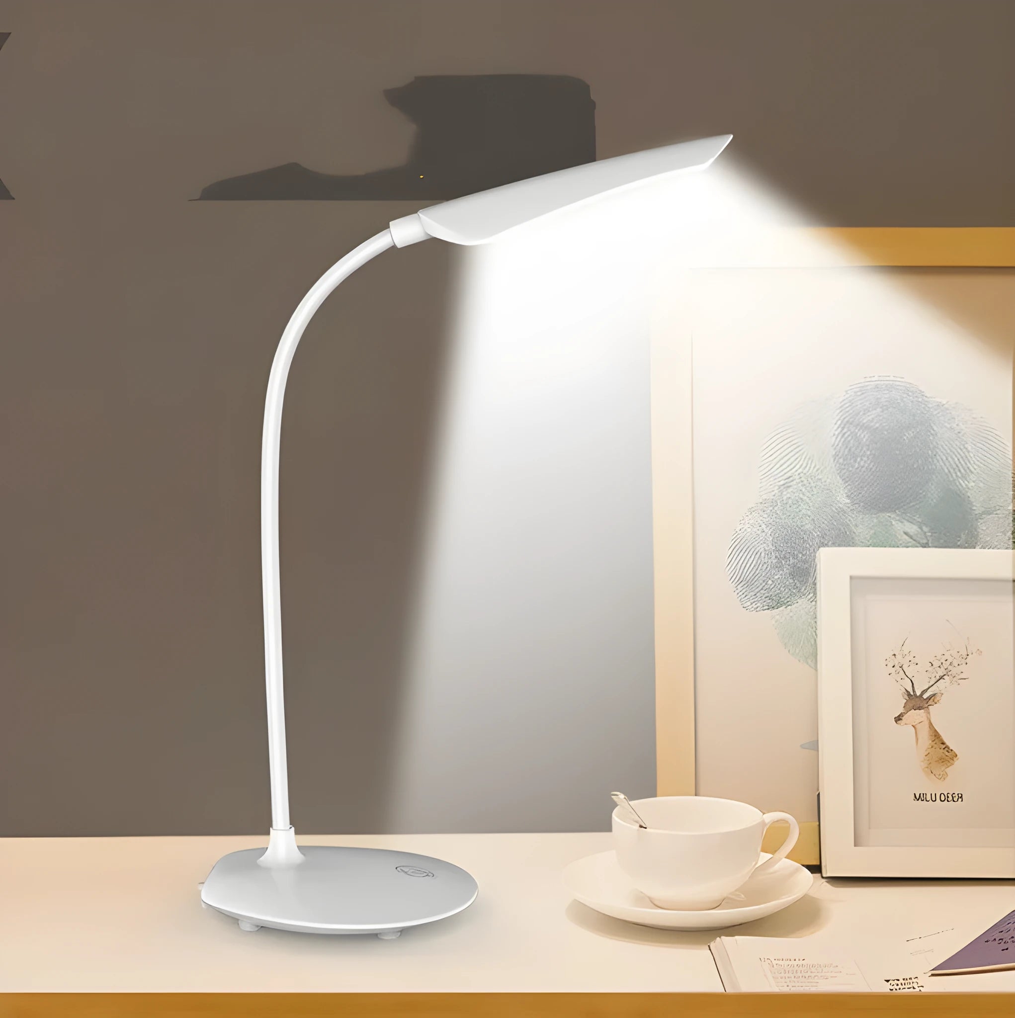 White LED desk lamp with USB charging cord and touch switch on a wooden desk