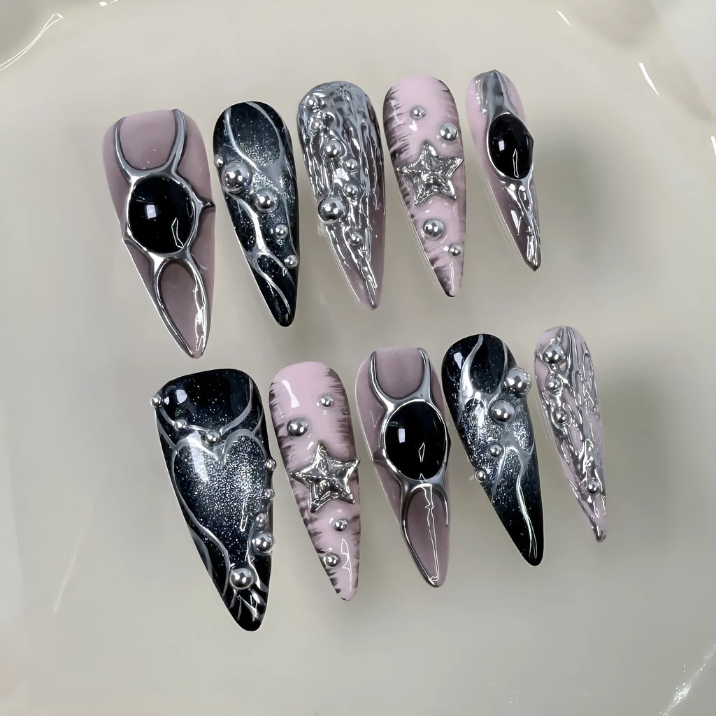 Set of long pointed dyed nails with metal hand-painted relief and cat eye finish in multiple sizes