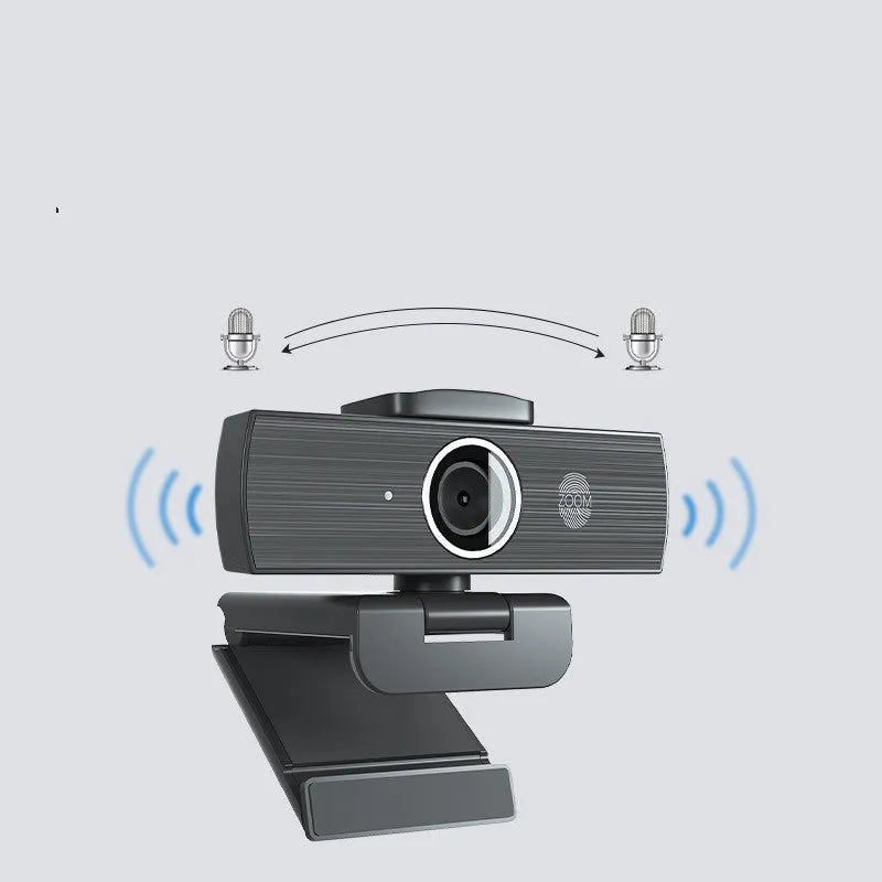Black USB webcam with magnetic privacy cover on a desk, showing 1.7m cable.