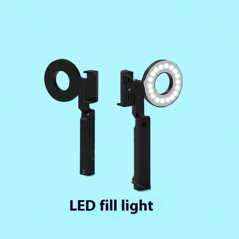 Black handheld LED fill light for mobile phone photography showing portable design
