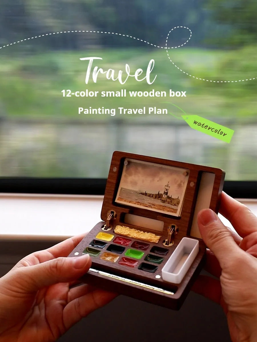 Mini walnut wooden box open to show watercolour pigment pans from Holbein, Schminke, Picasso, or Moonlight Treasure Box sets.