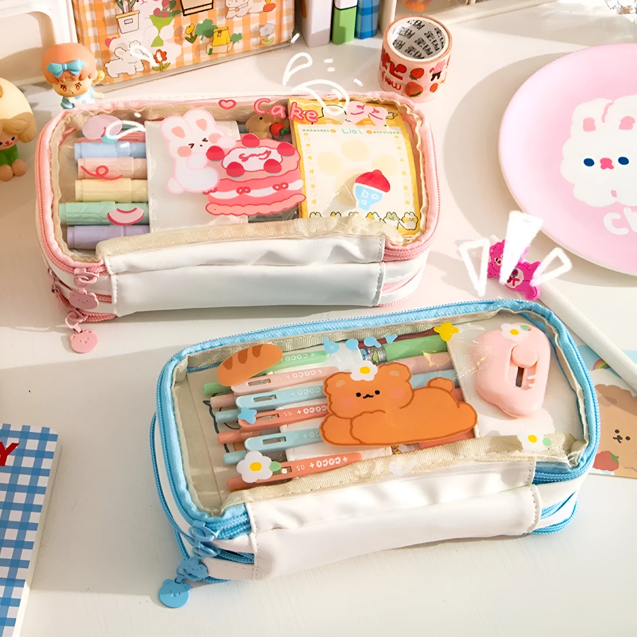 Transparent TPU pen bag with cartoon rabbit design in pink or red colour options.