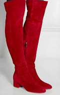 Grey suede women's flat over the knee boots with a pointed toe and low thick heel.