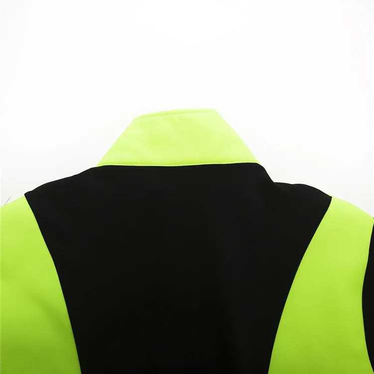 Unisex soft shell thermal fleece cycling jacket in black with green, side view
