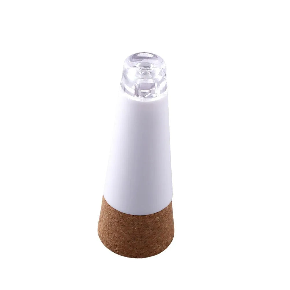 White plastic rechargeable LED cork light for bottle decoration, showing 15 LED beads.