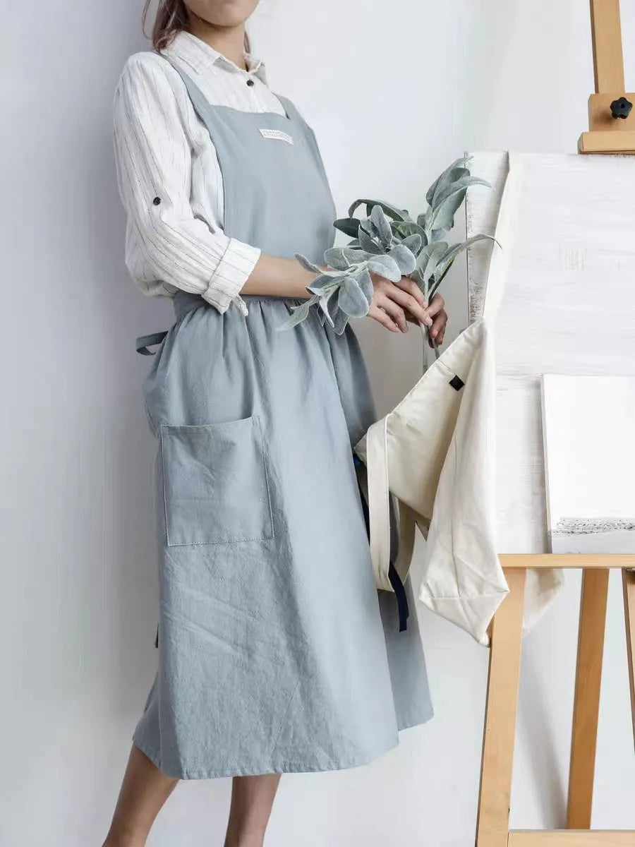 Cotton sleeveless kitchen apron in one size with plain antifouling design, available in six colours