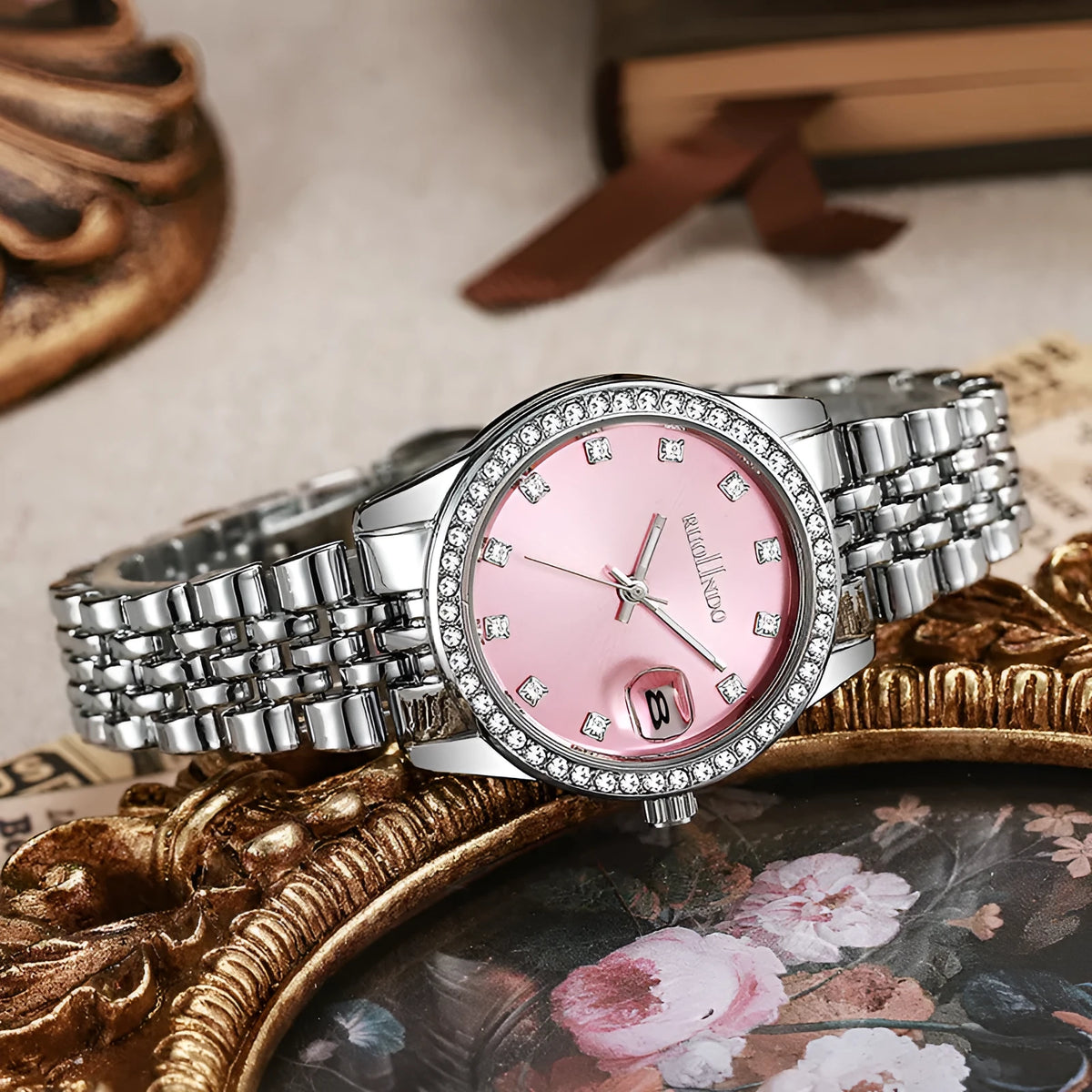 Women's quartz calendar watch with 32mm circular dial, alloy strap, and stainless steel folding buckle