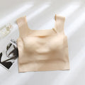 Women's seamless non-marking sling vest in light blue with integrated chest pad for light sports.