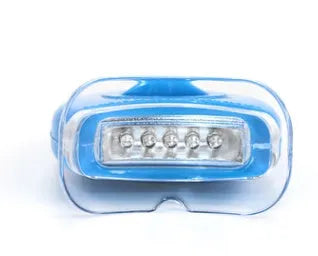 LED teeth whitening kit with button switch and denture tray in blue