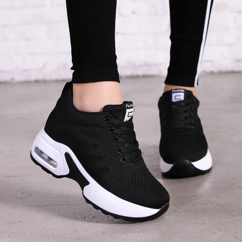 Soft sole mesh height-increasing casual shoes with polyurethane mid-heel in black and red colour options