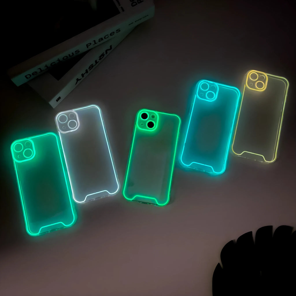 Glow in the dark soft TPU phone case for iPhone, shown in multiple colours including green, orange, and blue.