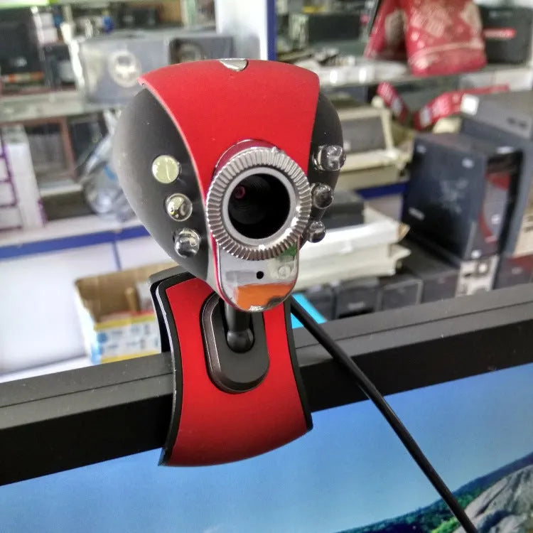 USB computer camera in red and black with CMOS sensor, 640x480 video, F6.0mm lens, and 84g weight