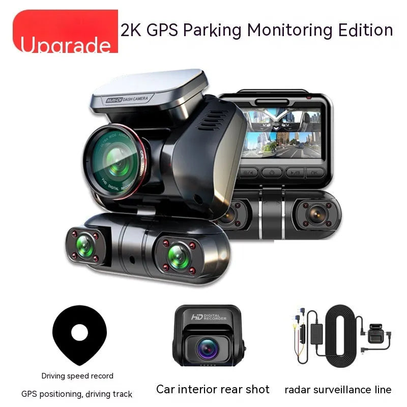 Black plastic dashboard camera with lens, showing a 2-inch screen on the rear for vehicle recording and surveillance.