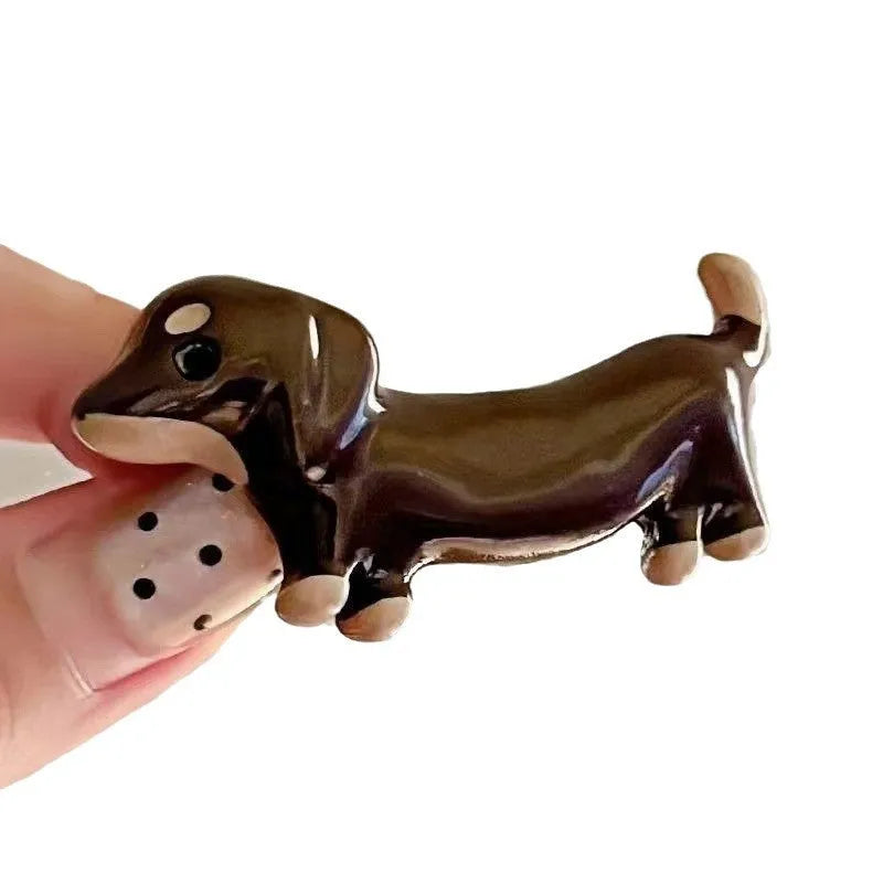 Dachshund dog design hair barrettes with electroplated finish, available as single clip or pair