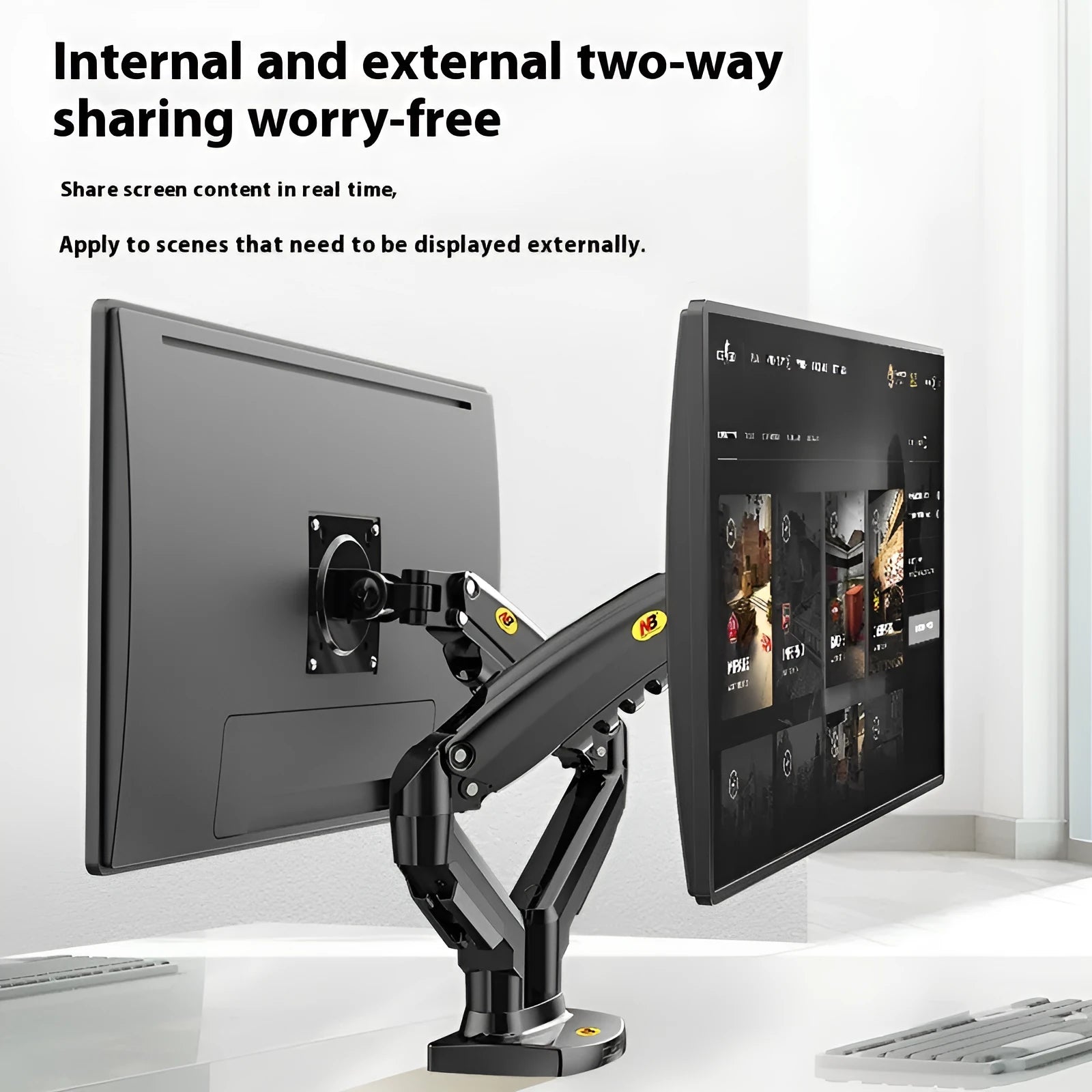 Dual computer monitor bracket with mechanical lifting mechanism on desktop