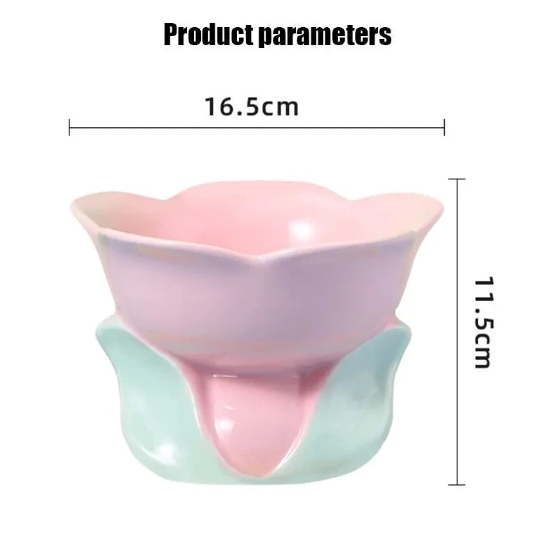 Blue ceramic elevated pet bowl with floral pattern and non-slip base for cat or small dog