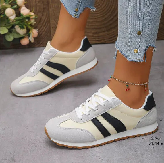 Blue and grey Cortez stripe leisure sports shoes with round toe and flat rubber sole.