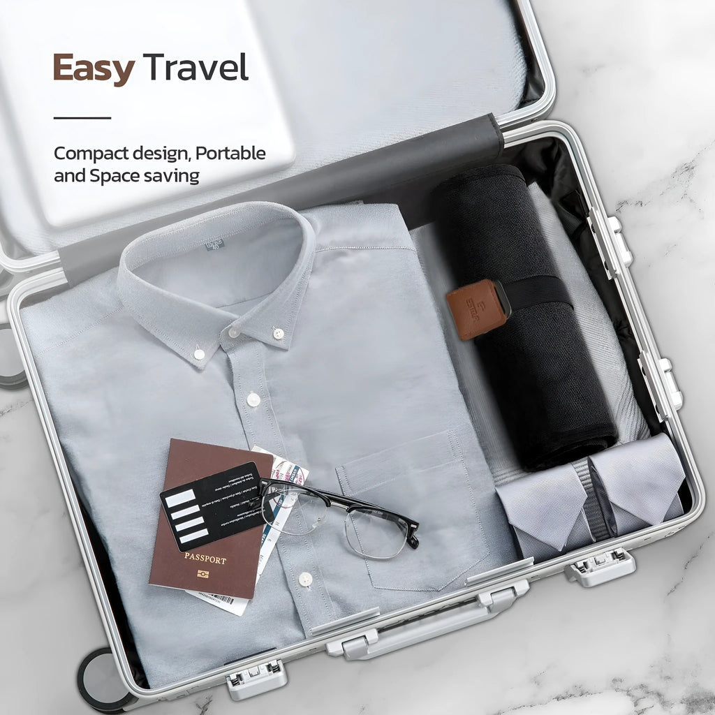 Men's black PU travel wash bag with portable reel design for toiletry organisation