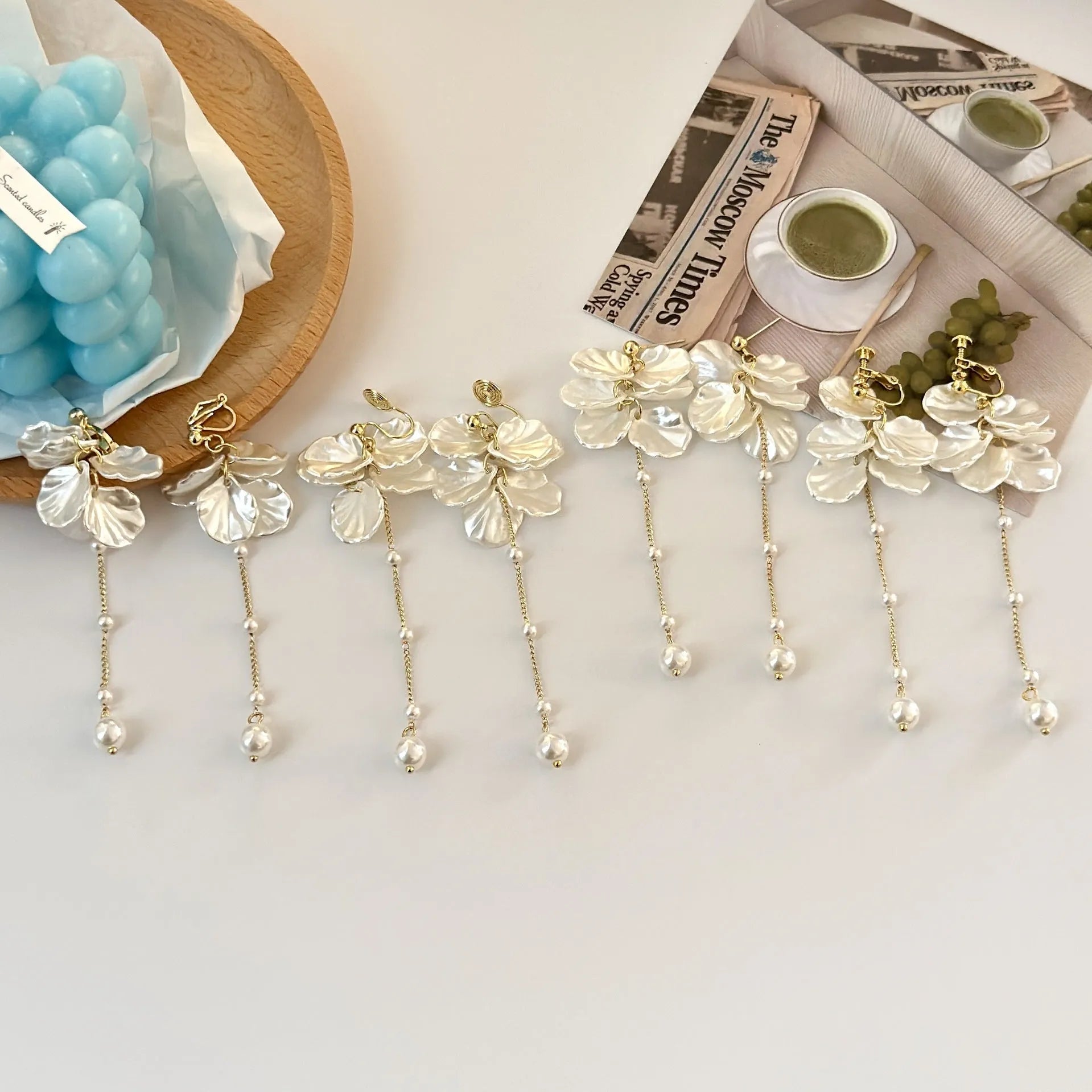 Women's acrylic shell pearl tassel earrings with 8.8cm length and four clip style options
