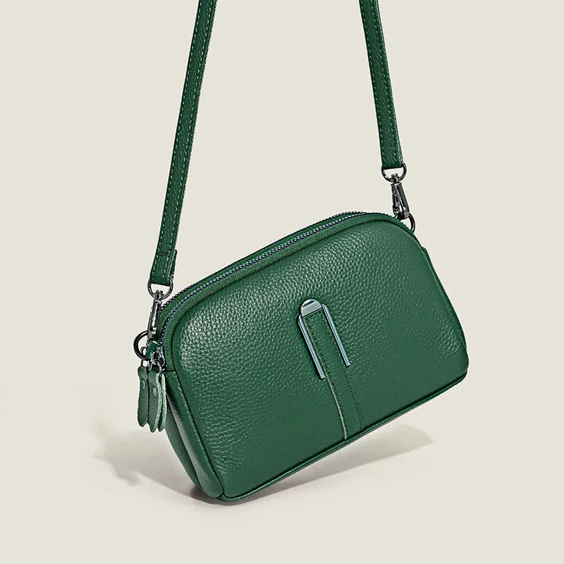 Minimalist crossbody bag in top-grain leather with spliced design, horizontal square shape, inner zippered pocket