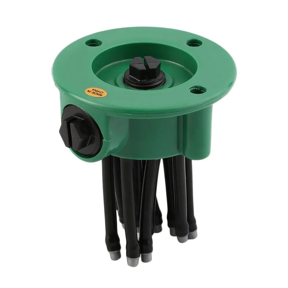 Green adjustable lawn sprinkler with bendable plastic nozzles on circular base