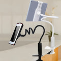 Black flexible mount holder with bendy arm and suction base holding a tablet