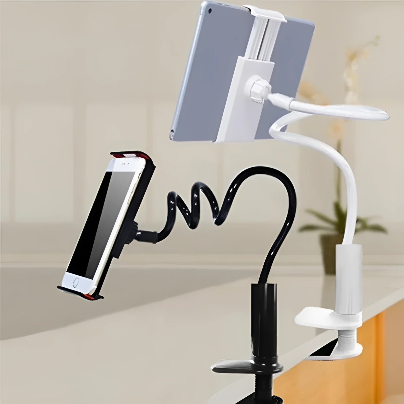 Black flexible mount holder with bendy arm and suction base holding a tablet