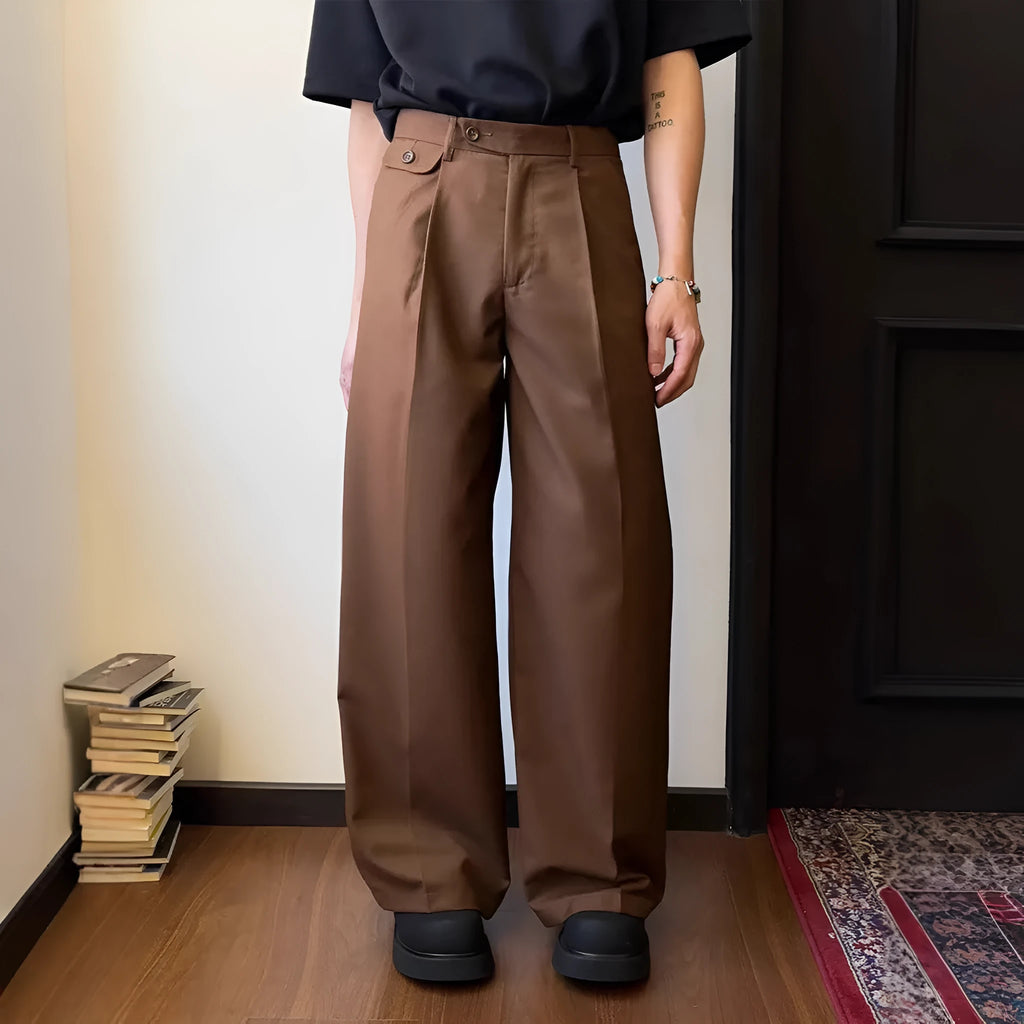 Men's brown straight-leg wide-leg casual trousers showing drape and fit
