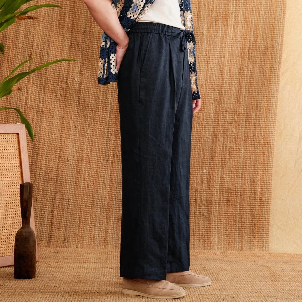 Linen straight-leg trousers with elasticated high waist and lace detail in greige colour.