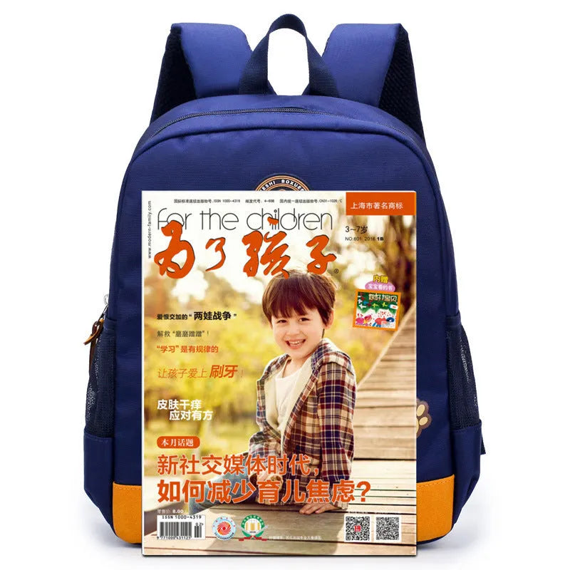 A deep blue children's school bag with a cartoon bear design on the front, showing the front pocket and adjustable straps.