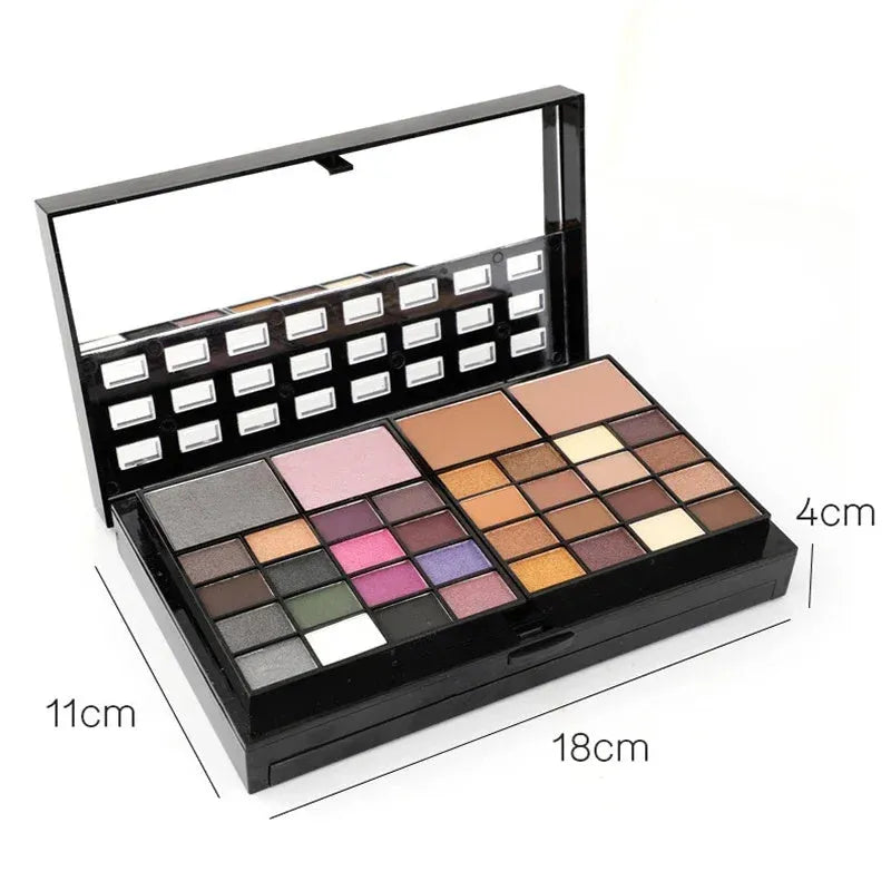 74 colour makeup palette open showing four layers of eyeshadow, lip gloss, blush and contour powders with included brushes.