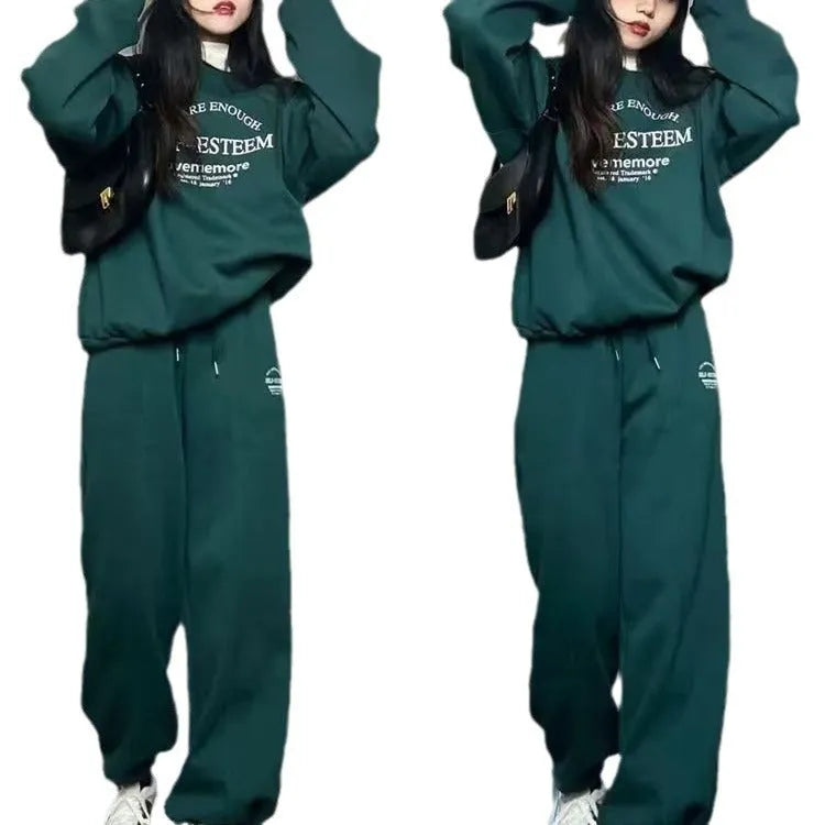 Women's cotton green American-style long-sleeved casual sportswear suit with trousers on a model