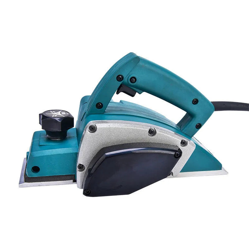 Red desktop electric wood planer with aluminium body, showing 82mm planing width