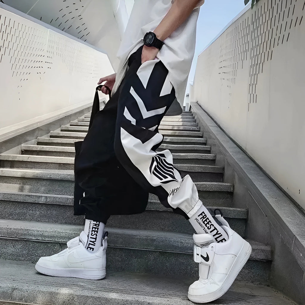 Mens hiphop tapered trousers in black acetate fibre with small-foot opening side view