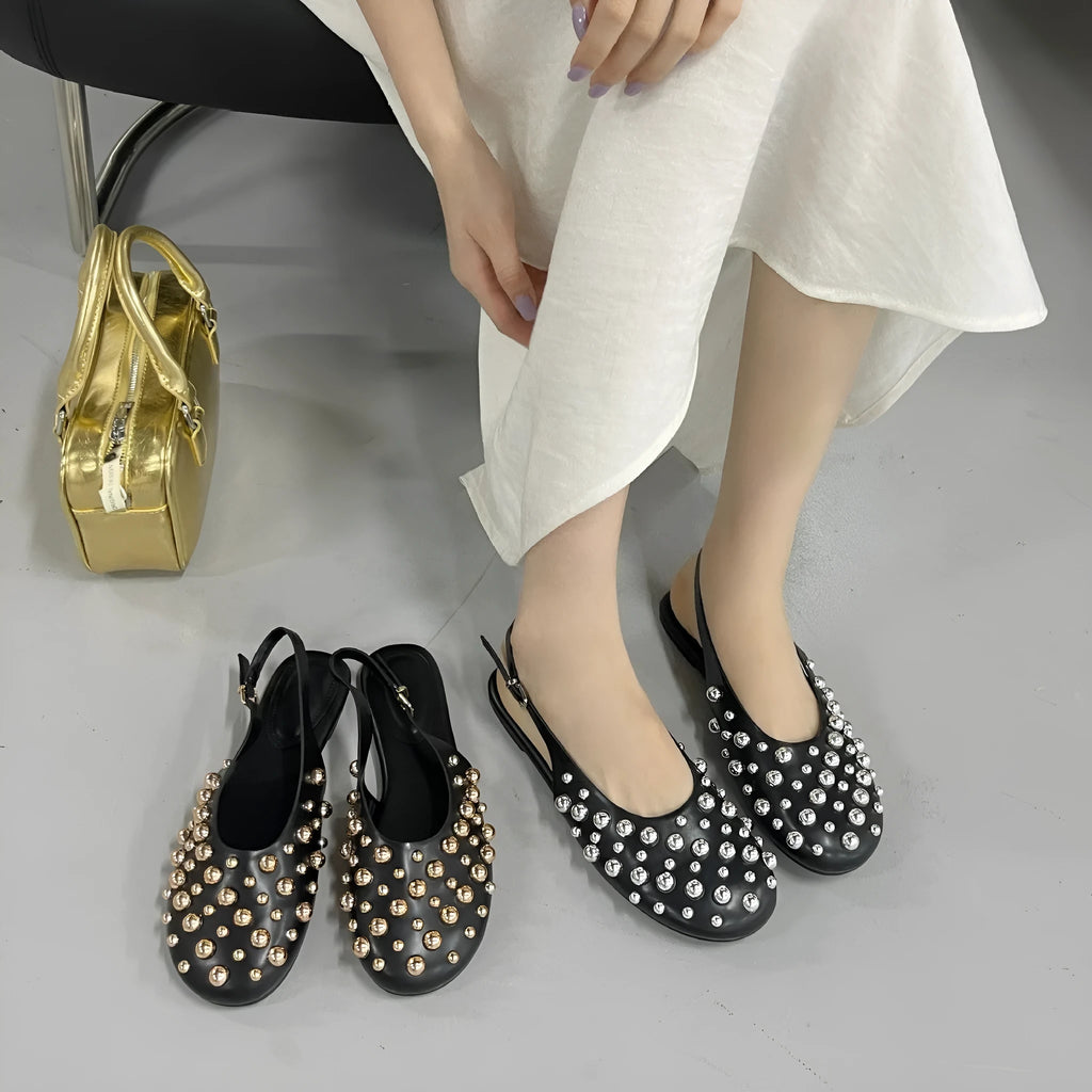 Women's flat sandals with rivet button detail, cowhide upper, black gold and black silver, sizes 35-43.