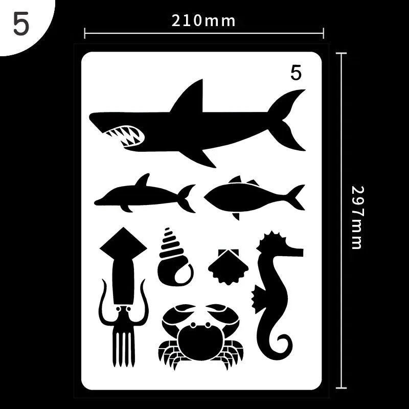 Set of white plastic drawing stencils with various cut-out design patterns