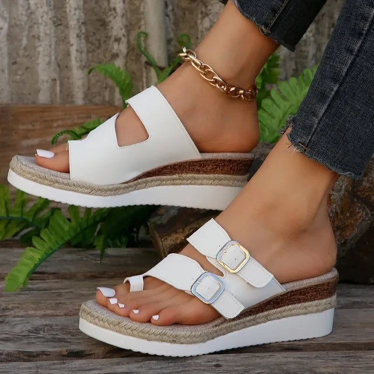 White woven patent leather wedge sandals with peep toe and finger fit design
