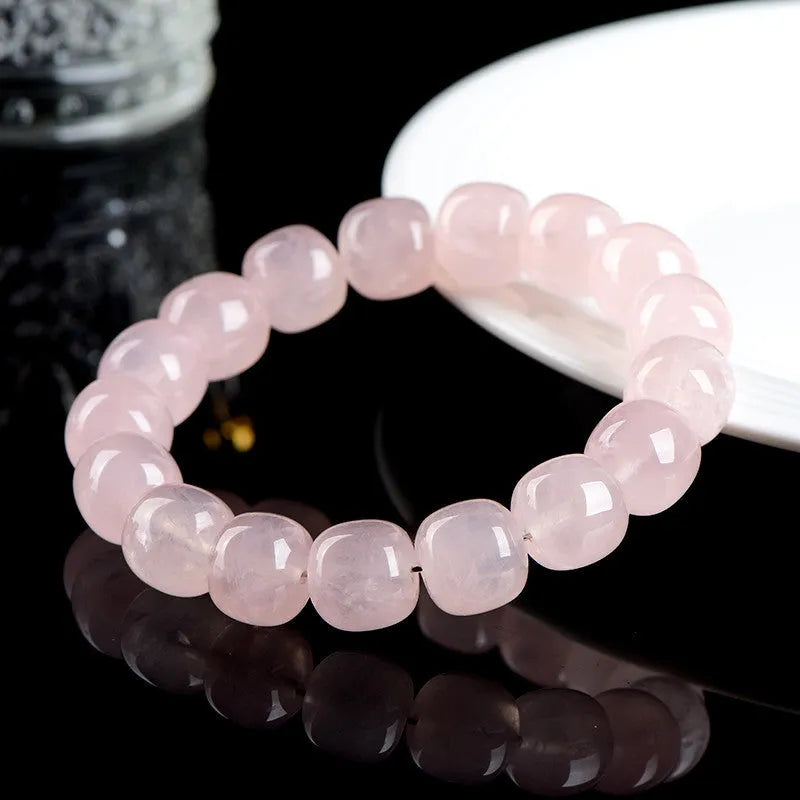 Pink crystal barrel bead bracelet with 11-12mm geometric beads and unisex design