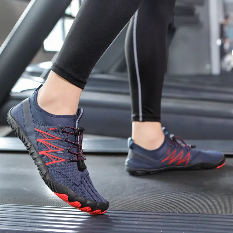Indoor fitness sneakers in various colours with rubber sole and mesh upper for men and women training